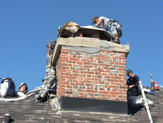 Rancho Palos Verdes Chimney Sweep installing a custom chimney crown in Rancho Palos Verdes, CA