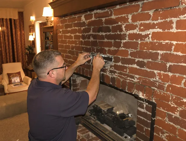 Rancho Palos Verdes Chimney Sweep expert fixing a fireplace in Rancho Palos Verdes, CA
